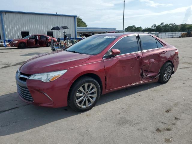 TOYOTA CAMRY LE 2017 with VIN 4T1BF1FK8HU701956 - Photo from auction