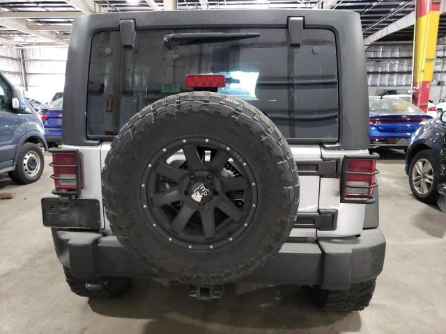 Снимка 6 от търг – 2012 JEEP WRANGLER U с VIN 1C4BJWDG2CL203524