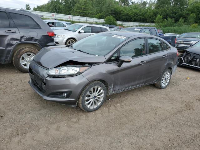 FORD FIESTA SE 2014 with VIN 3FADP4BJ0EM185445 - Photo from auction