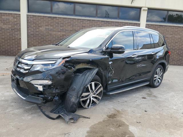 HONDA PILOT TOUR 2017 with VIN 5FNYF6H99HB054417 - Photo from auction
