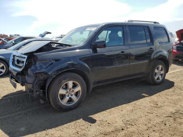 HONDA PILOT EXLN 2011 with VIN 5FNYF4H7XBB017063 - Photo from auction