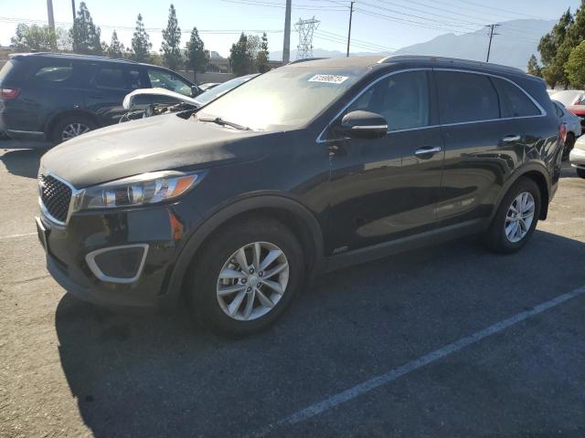 KIA SORENTO 2018 with VIN 5XYPGDA36JG431111 - Photo from auction