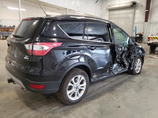 Photo 3 from auction – 2017 FORD ESCAPE SE with VIN 1FMCU9G90HUC79783