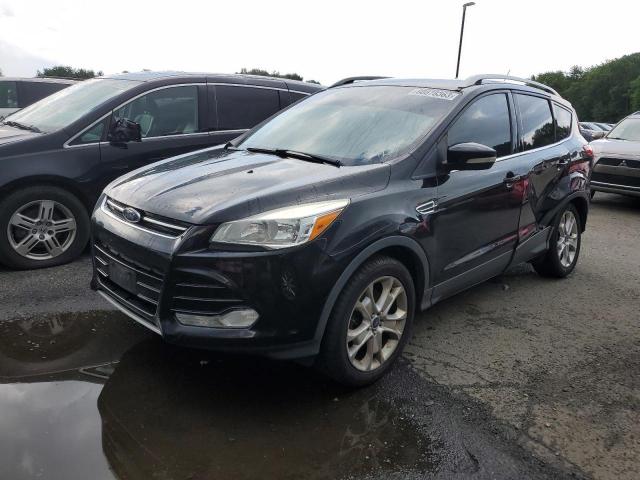 FORD ESCAPE TIT 2016 with VIN 1FMCU9JX8GUA00876 - Photo from auction