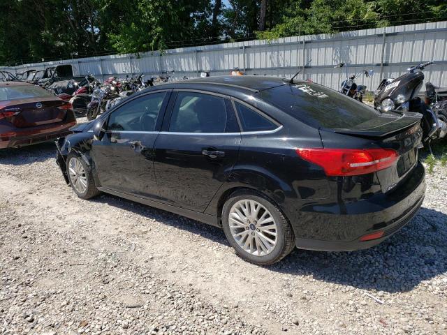 Photo 2 from auction – 2015 FORD FOCUS TITA with VIN 1FADP3J27FL354299