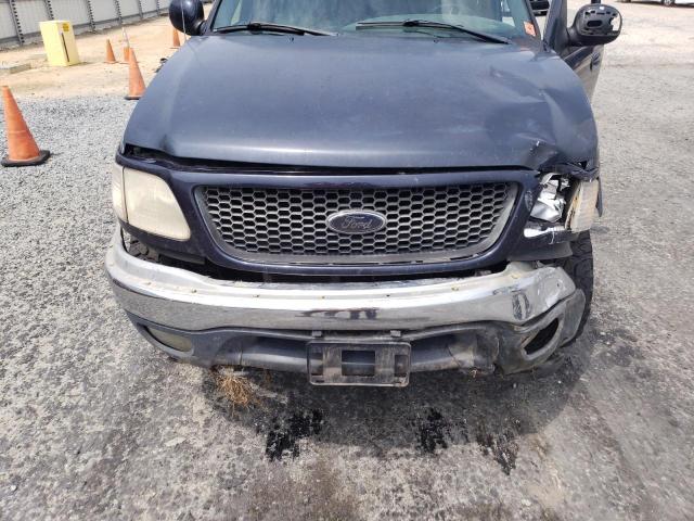 Photo 11 from auction – 2001 FORD F150 SUPER with VIN 1FTRW08L31KE44709