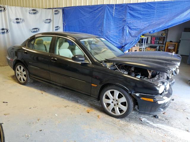 Photo 4 from auction – 2004 JAGUAR X-TYPE AWD with VIN SAJEA51C54WE04492