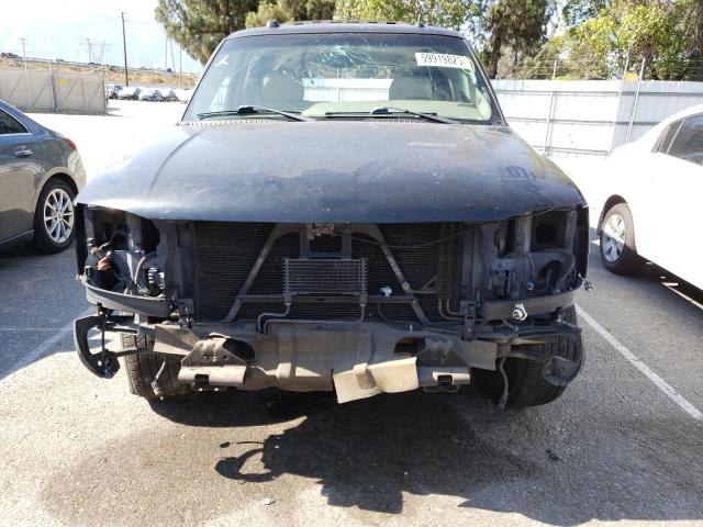 Photo 5 from auction – 2004 GMC YUKON with VIN 1GKEK13T44R252044