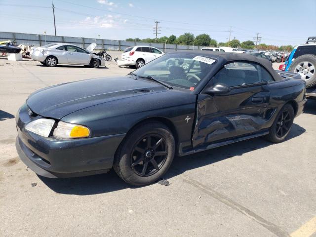 FORD MUSTANG 1998 with VIN 1FAFP4441WF223573 - Photo from auction