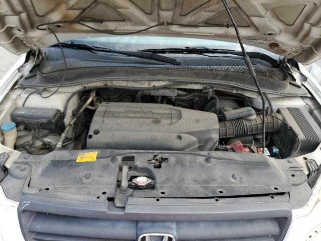 Photo 12 from auction – 2004 HONDA PILOT with VIN 2HKYF18524H524136