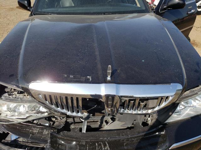 Photo 11 from auction – 2003 LINCOLN TOWN CAR E with VIN 1LNHM81W83Y643044
