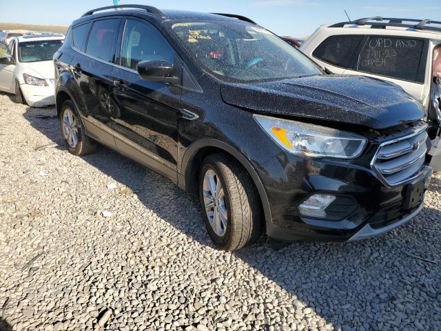 Photo 4 from auction – 2018 FORD ESCAPE SE with VIN 1FMCU9GD4JUA72825