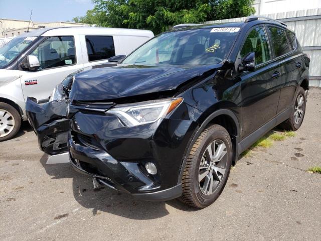 TOYOTA RAV4 XLE 2017 with VIN 2T3RFREV0HW651859 - Photo from auction