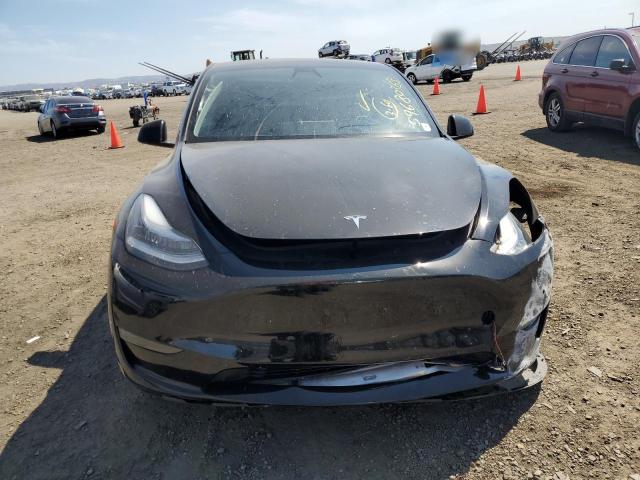 Photo 5 from auction – 2022 TESLA MODEL Y with VIN 7SAYGDEE2NF372655