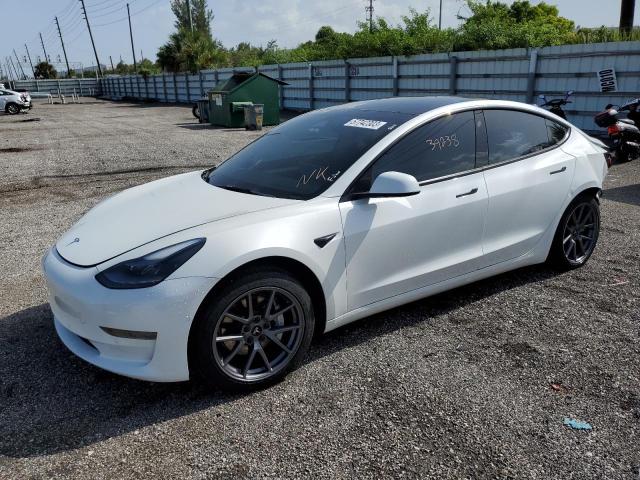 TESLA MODEL 3 2021 with VIN 5YJ3E1EAXMF096684 - Photo from auction