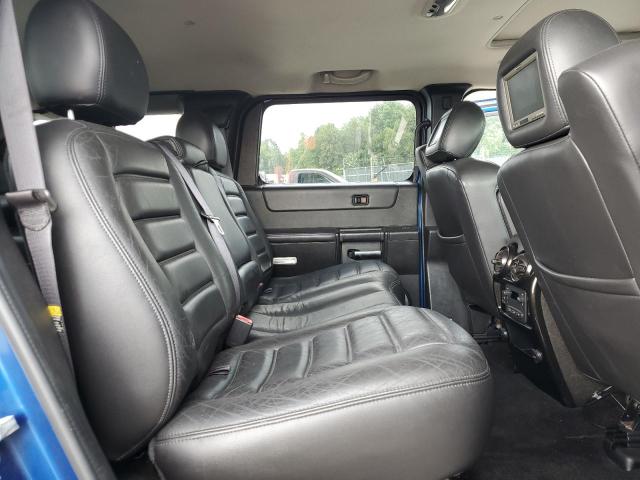 Photo 11 from auction – 2006 HUMMER H2 with VIN 5GRGN23U16H103690