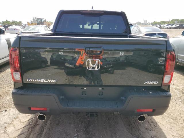 Photo 6 from auction – 2023 HONDA RIDGELINE with VIN 5FPYK3F50PB024562