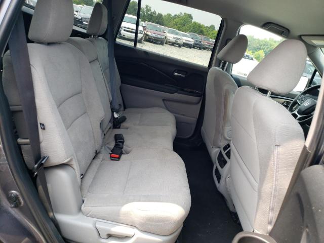 Photo 11 from auction – 2020 HONDA PILOT LX with VIN 5FNYF5H12LB026133