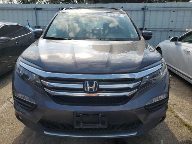 Photo 5 from auction – 2018 HONDA PILOT TOUR with VIN 5FNYF6H98JB039042