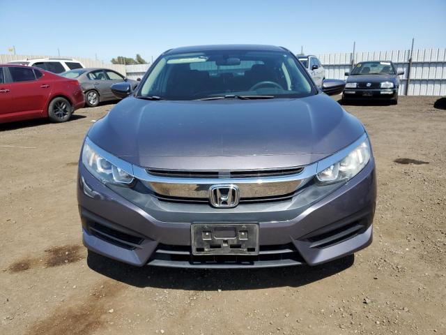 Photo 5 from auction – 2016 HONDA CIVIC LX with VIN 2HGFC2F54GH511590