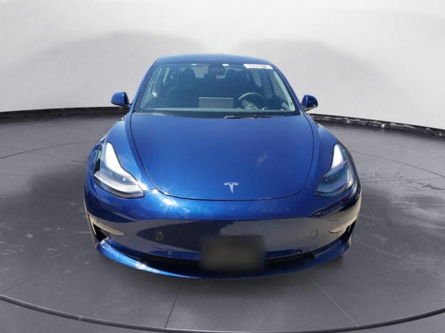 Photo 5 from auction – 2022 TESLA MODEL 3 with VIN 5YJ3E1EB1NF275416