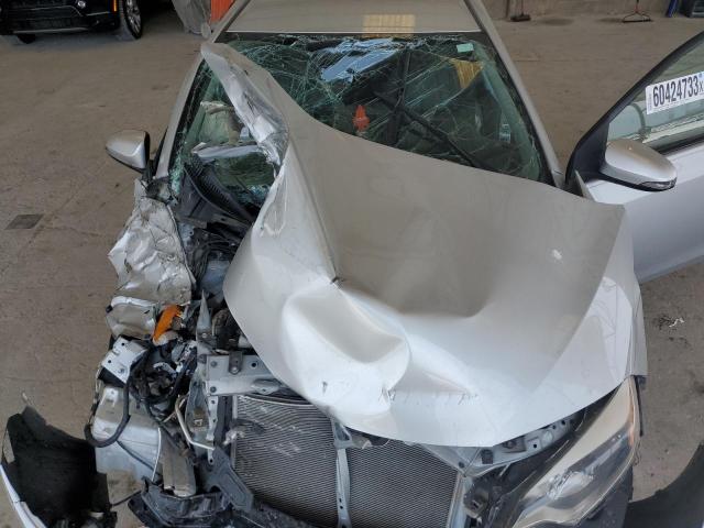 Photo 11 from auction – 2014 TOYOTA COROLLA L with VIN 2T1BURHEXEC163320