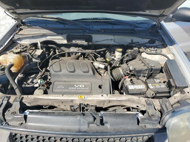 Photo 12 from auction – 2002 FORD ESCAPE XLS with VIN 1FMYU01152KE01951