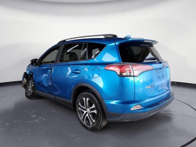 Photo 2 from auction – 2017 TOYOTA RAV4 LE with VIN JTMZFREV1HJ136965