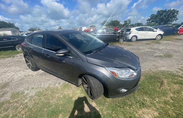 FORD FOCUS SEL 2012 with VIN 1FAHP3M28CL390351 - Photo from auction
