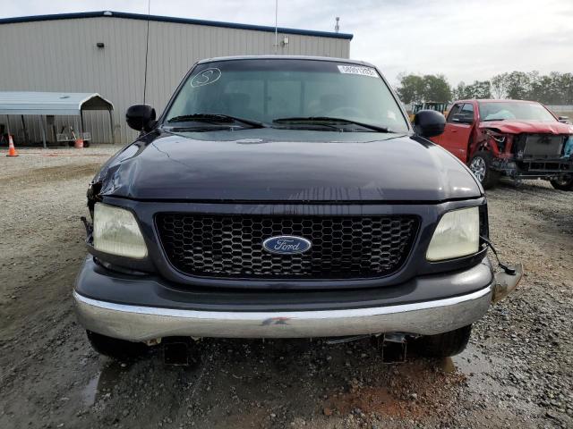 Photo 5 from auction – 2001 FORD F150 with VIN 1FTRX17L21NB76108