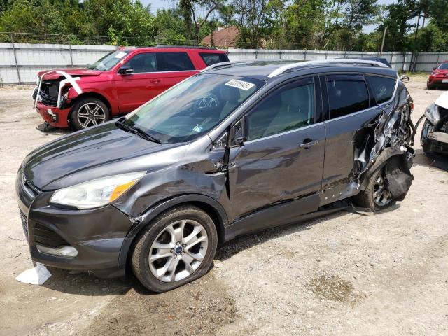 FORD ESCAPE TIT 2016 with VIN 1FMCU9JX0GUA36268 - Photo from auction