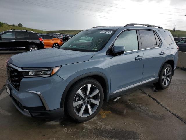 HONDA PILOT ELIT 2023 with VIN 5FNYG1H81PB021501 - Photo from auction
