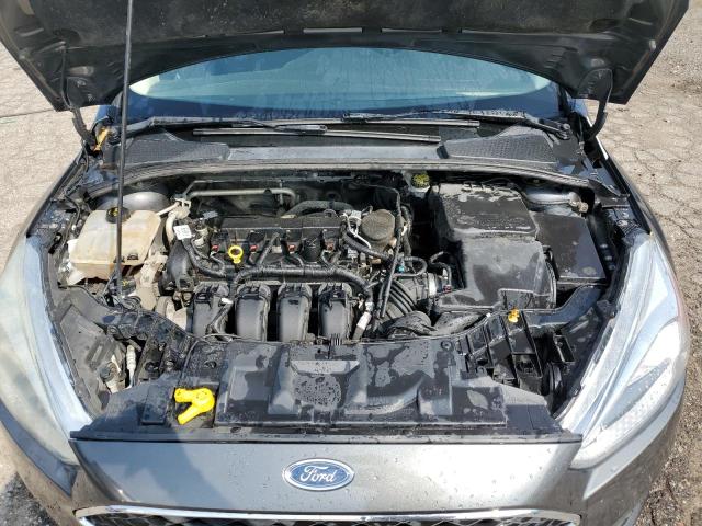 Photo 11 from auction – 2015 FORD FOCUS SE with VIN 1FADP3F20FL210263