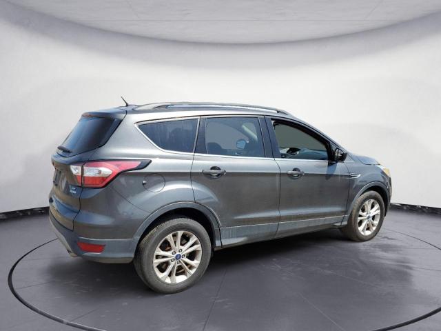 Photo 3 from auction – 2018 FORD ESCAPE SE with VIN 1FMCU0GD1JUA74592
