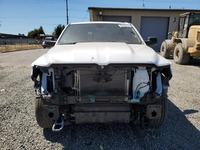 Photo 5 from auction – 2022 RAM 1500 TRADE with VIN 1C6SRFCT2NN299550