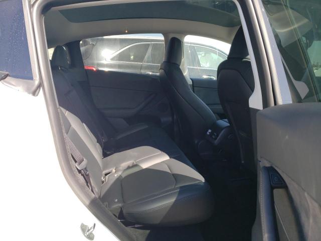Photo 11 from auction – 2023 TESLA MODEL Y with VIN 7SAYGDEEXPA065198
