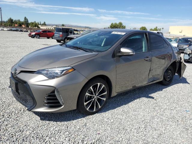 TOYOTA COROLLA L 2019 with VIN 2T1BURHE0KC143556 - Photo from auction