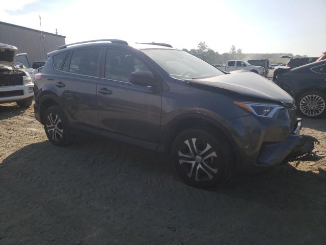 Photo 4 from auction – 2017 TOYOTA RAV4 LE with VIN JTMZFREV3HJ717433