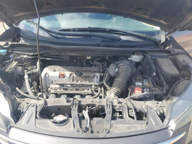 Photo 11 from auction – 2014 HONDA CR-V LX with VIN 3CZRM3H34EG716389