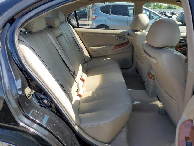 Photo 10 from auction – 2002 INFINITI I35 with VIN JNKDA31A32T011694