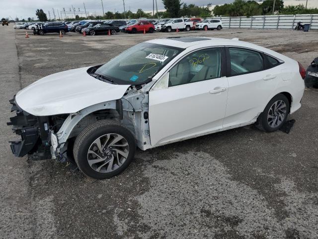 HONDA CIVIC EX 2018 with VIN 19XFC2F71JE010918 - Photo from auction