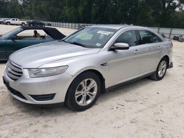 FORD TAURUS SEL 2013 with VIN 1FAHP2E80DG104323 - Photo from auction