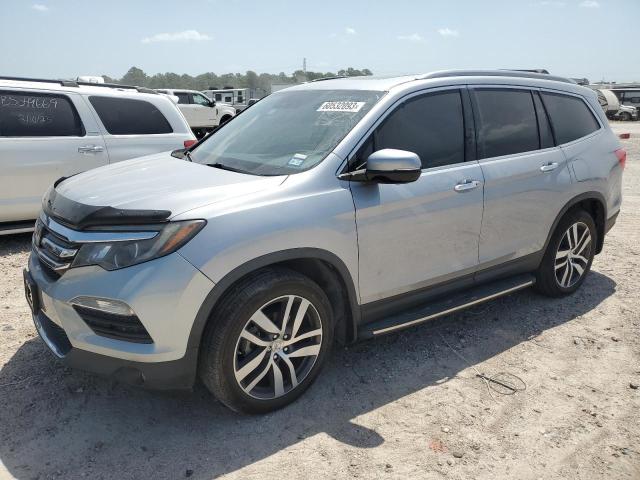 HONDA PILOT ELIT 2018 with VIN 5FNYF6H07JB044105 - Photo from auction
