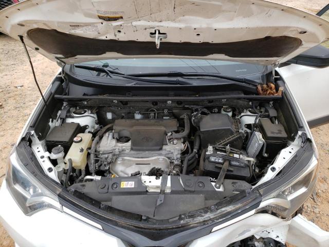 Photo 11 from auction – 2018 TOYOTA RAV4 LE with VIN JTMBFREV0JD250249