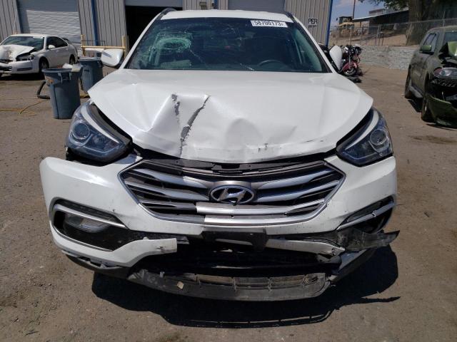 Photo 5 from auction – 2018 HYUNDAI SANTA FE S with VIN 5NMZU3LB1JH107490