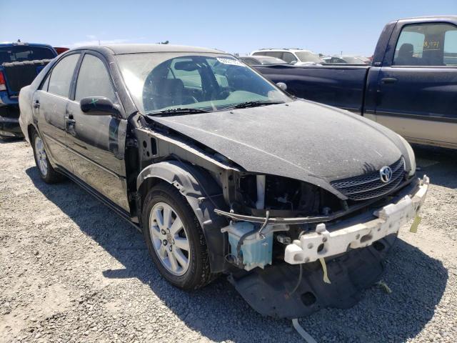Photo 4 from auction – 2003 TOYOTA CAMRY LE with VIN JTDBE32K730238782