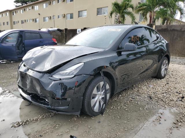 TESLA MODEL Y 2022 with VIN 7SAYGDEE8NA005093 - Photo from auction