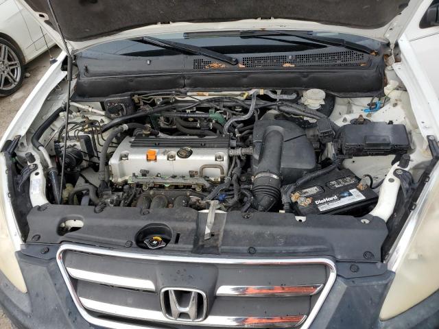 Photo 12 from auction – 2005 HONDA CR-V LX with VIN JHLRD68595C012056