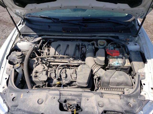 Photo 11 from auction – 2015 FORD TAURUS SEL with VIN 1FAHP2E89FG172204