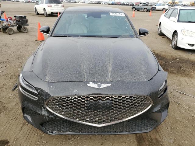 Photo 5 from auction – 2022 GENESIS G70 BASE with VIN KMTG34TA9NU094379